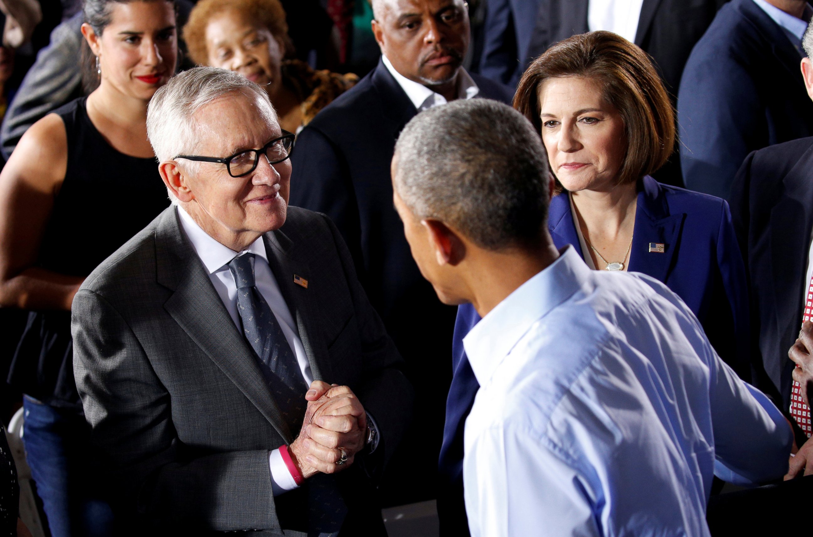 PHOTO: President Barack Obama is greeted by Senate Democratic leader Harry Reid (L) and Senate candidate Catherine Cortez Masto (R) during rally in support of Hillary Clinton's campaign in Las Vegas, Oct. 23, 2016.