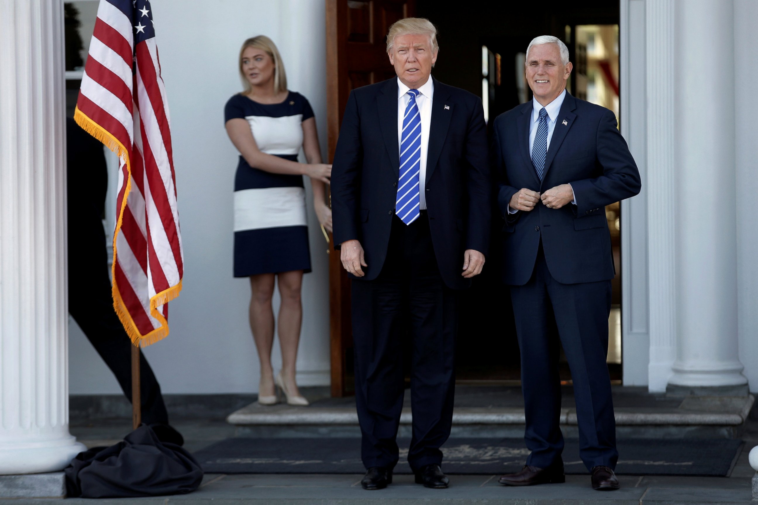 PHOTO: President-elect Donald Trump and Vice President-elect Mike Pence stand together as they arrive at the the main clubhouse at Trump National Golf Club in Bedminster, New Jersey, Nov. 19, 2016. 