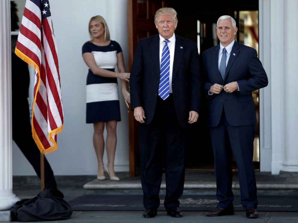 PHOTO: President-elect Donald Trump and Vice President-elect Mike Pence stand together as they arrive at the the main clubhouse at Trump National Golf Club in Bedminster, New Jersey, Nov. 19, 2016.