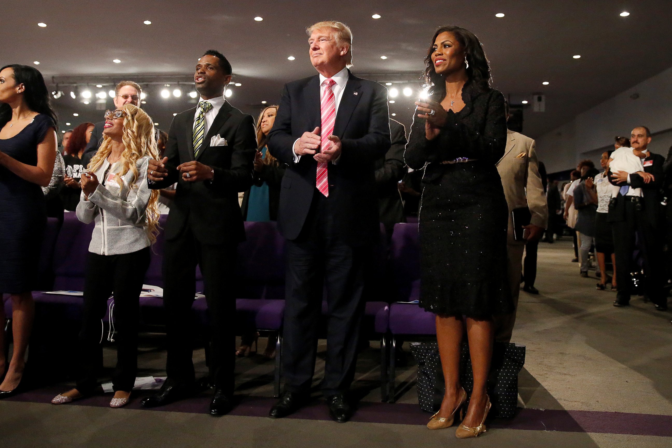 PHOTO: Republican presidential nominee Donald Trump and Omarosa Manigault attend a church service, in Detroit, Michigan, Sept. 3, 2016. 