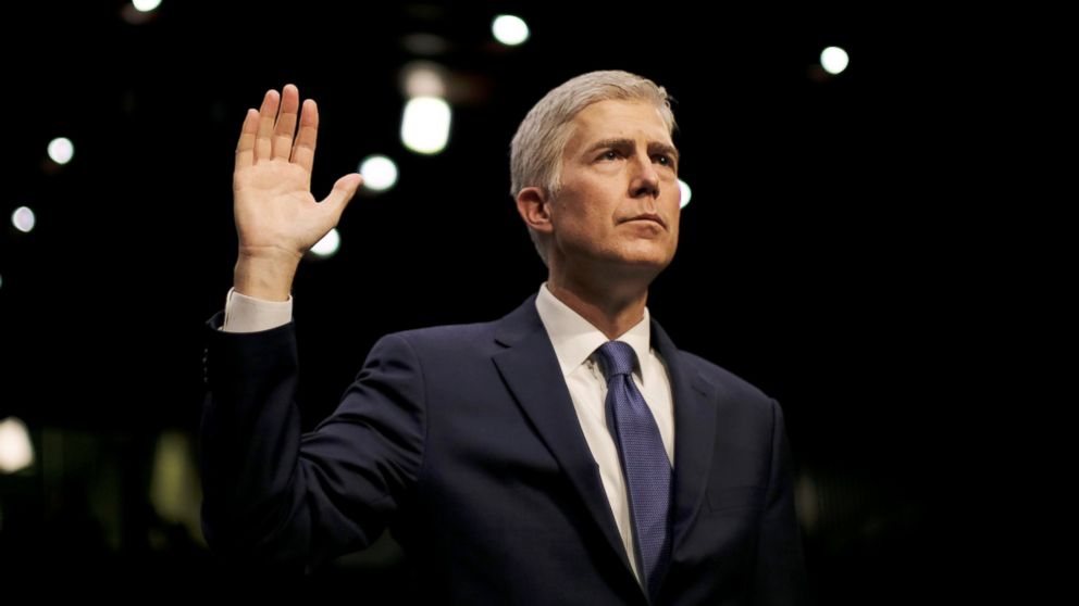 U.S. Supreme Court nominee judge Neil Gorsuch is sworn in to testify at his Senate Judiciary Committee confirmation hearing on Capitol Hill in Washington, March 20, 2017.