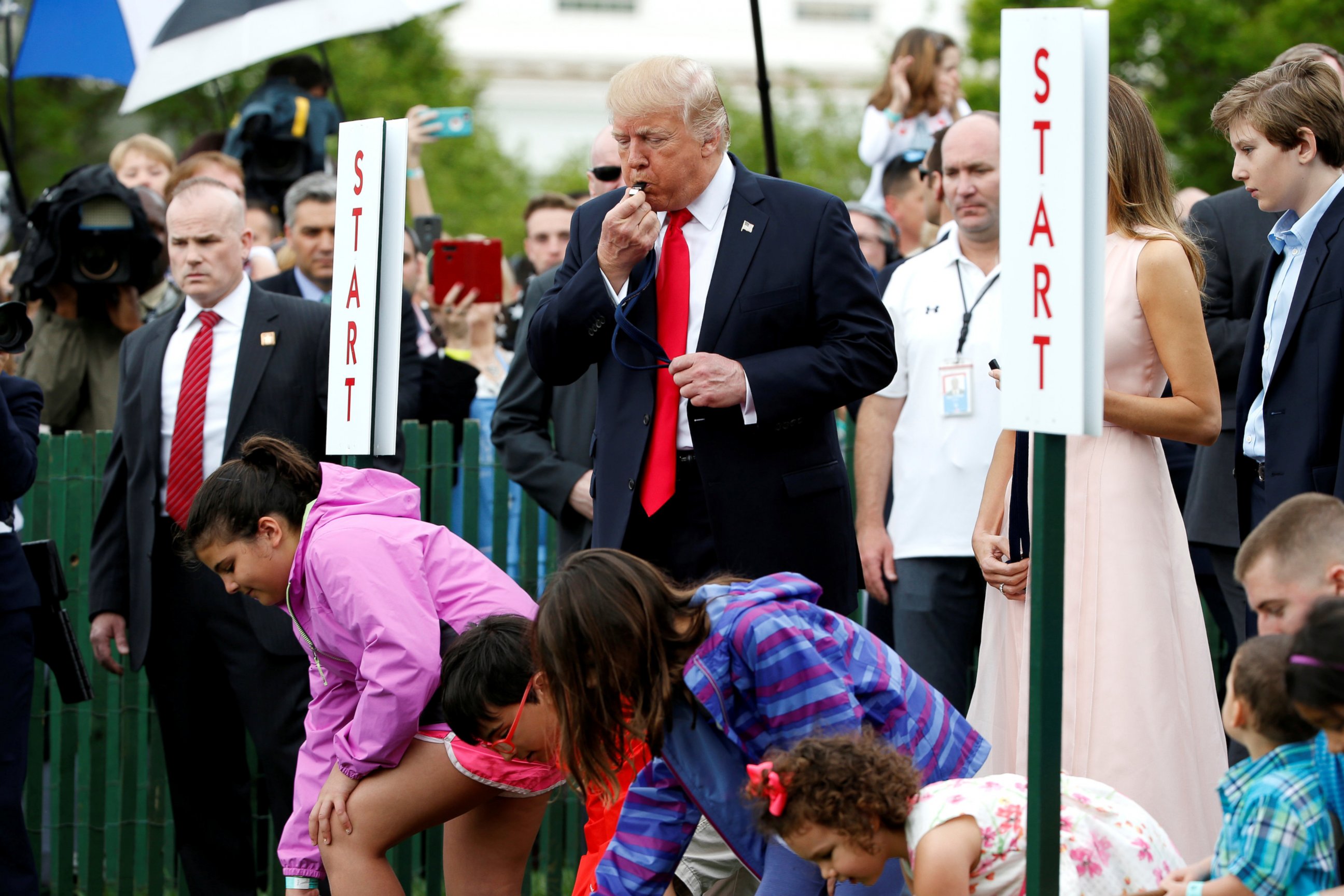 PHOTO: President Donald Trump blows a whistle to start the White House Easter Egg Roll on the South Lawn of the White House in Washington, April 17, 2017.
