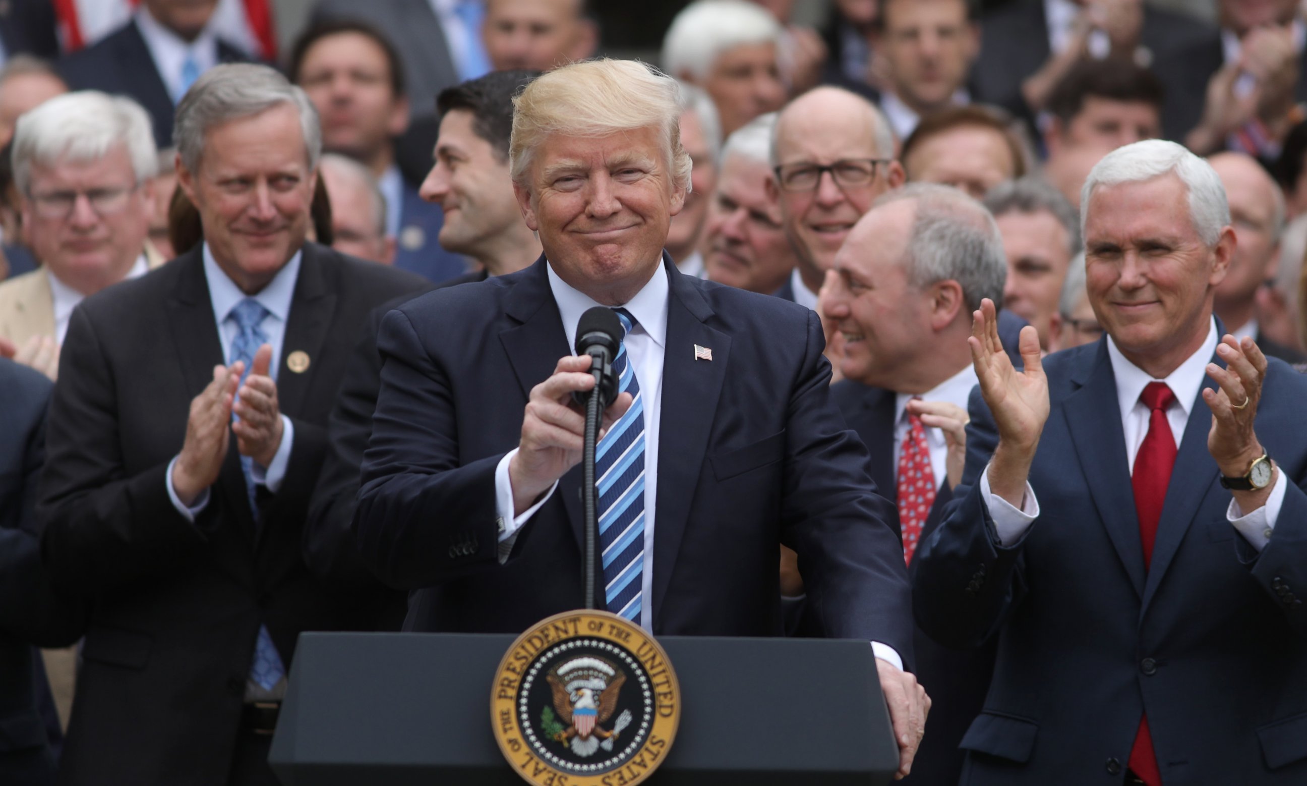 PHOTO: President Donald Trump gathers with Vice President Mike Pence, right, and Congressional Republicans in the Rose Garden of the White House after the House of Representatives approved the American Healthcare Act, May 4, 2017. 