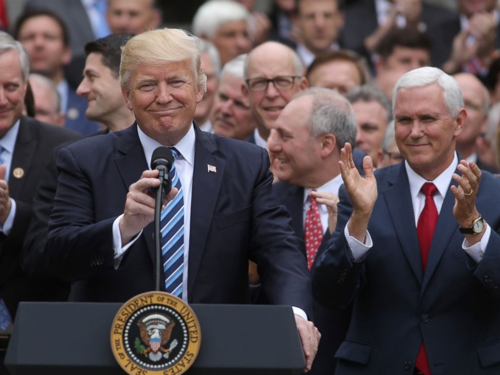 PHOTO: President Donald Trump gathers with Vice President Mike Pence, right, and Congressional Republicans in the Rose Garden of the White House after the House of Representatives approved the American Healthcare Act, May 4, 2017.