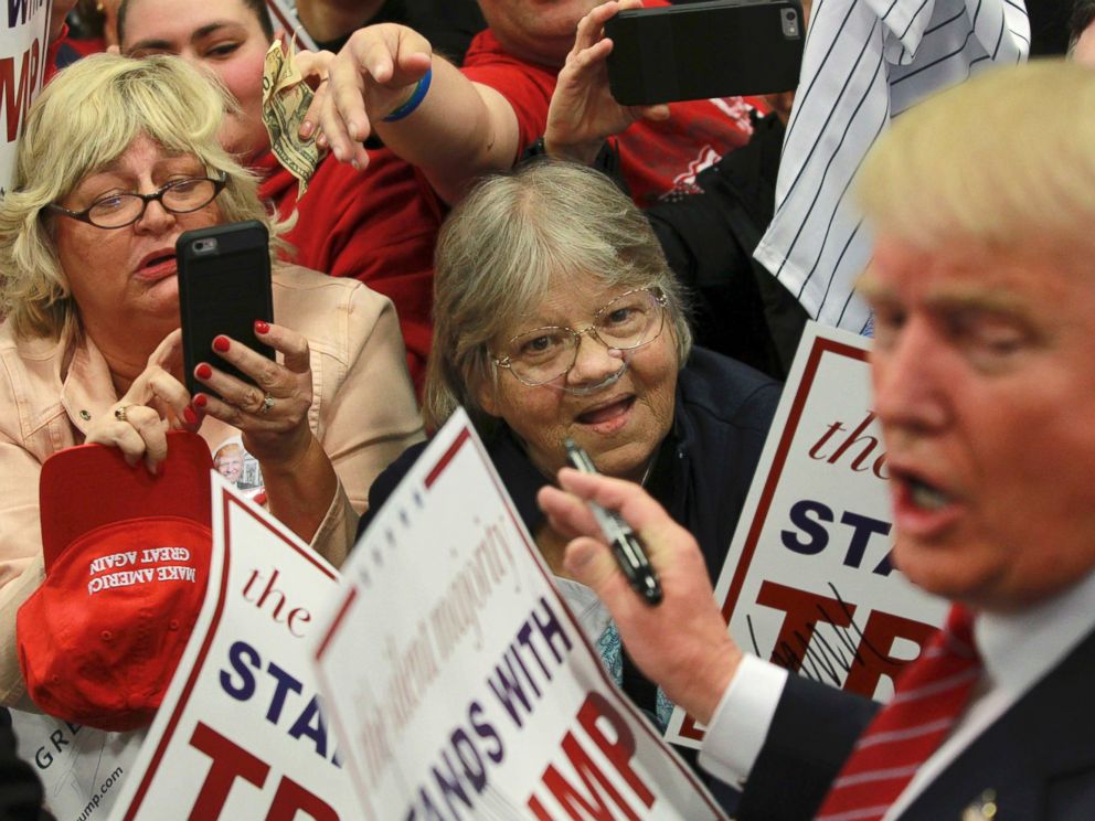 PHOTO: Supporters of Republican U.S. presidential candidate Donald Trump take pictures and seek autographs from Trump (R) at a campaign rally in New Orleans, Louisiana March 4, 2016.