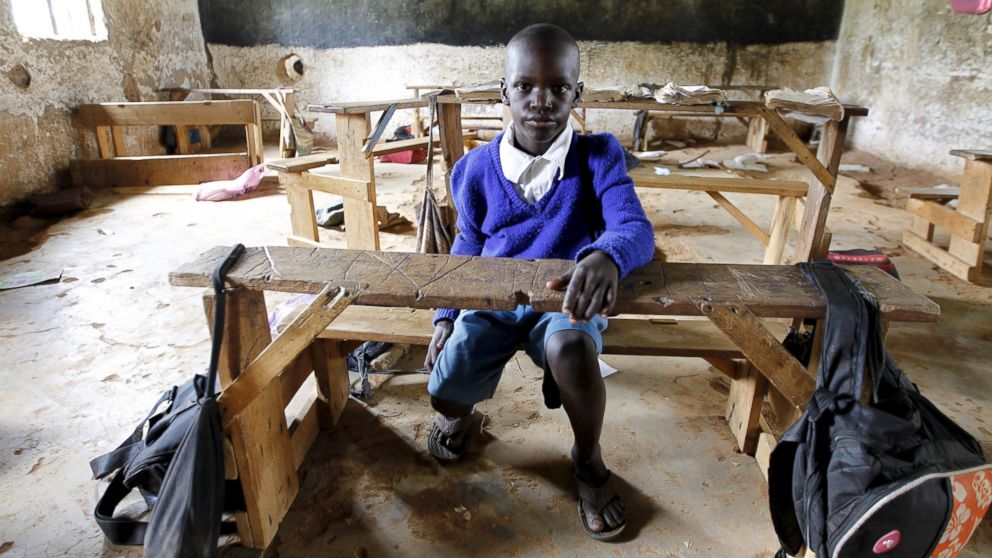 PHOTO: Seven-year-old Barack Obama Okoth, named after President Barack Obama, sits inside an empty classroom as he speaks with Reuters at the Senator Obama primary school in Nyangoma village in Kogelo, west of Kenya's capital Nairobi, June 23, 2015.