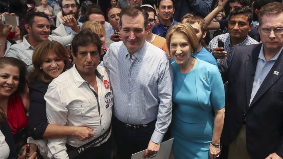 PHOTO:Republican presidential candidate Ted Cruz and former Republican presidential candidate Carly Fiorina pose for photos after she endorsed Cruz at a campaign rally in Miami, March 9, 2016. 