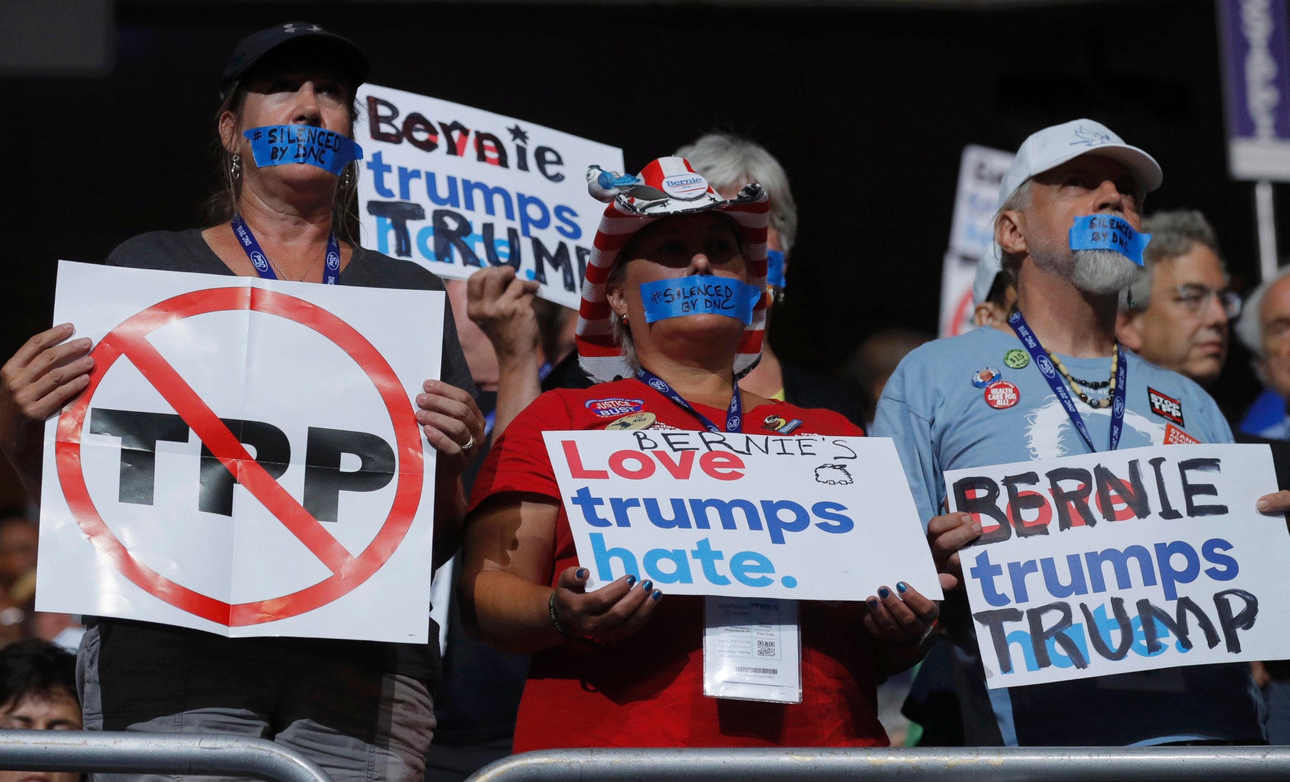 PHOTO: Supporters of Bernie Sanders wear tape across their mouths in protest on the floor at the Democratic National Convention in Philadelphia, July 25, 2016.