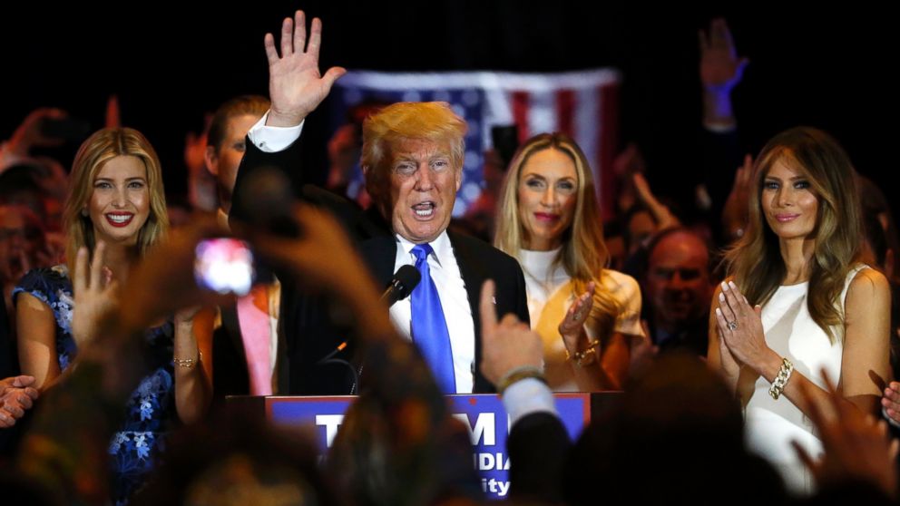 Republican presidential candidate Donald Trump waves with his daughter Ivanka, left, his son Eric's wife Lara Yunaska, second right, and his wife Melania after speaking at a campaign victory party following the results of the Indiana state primary, at Trump Tower in New York, May 3, 2016.