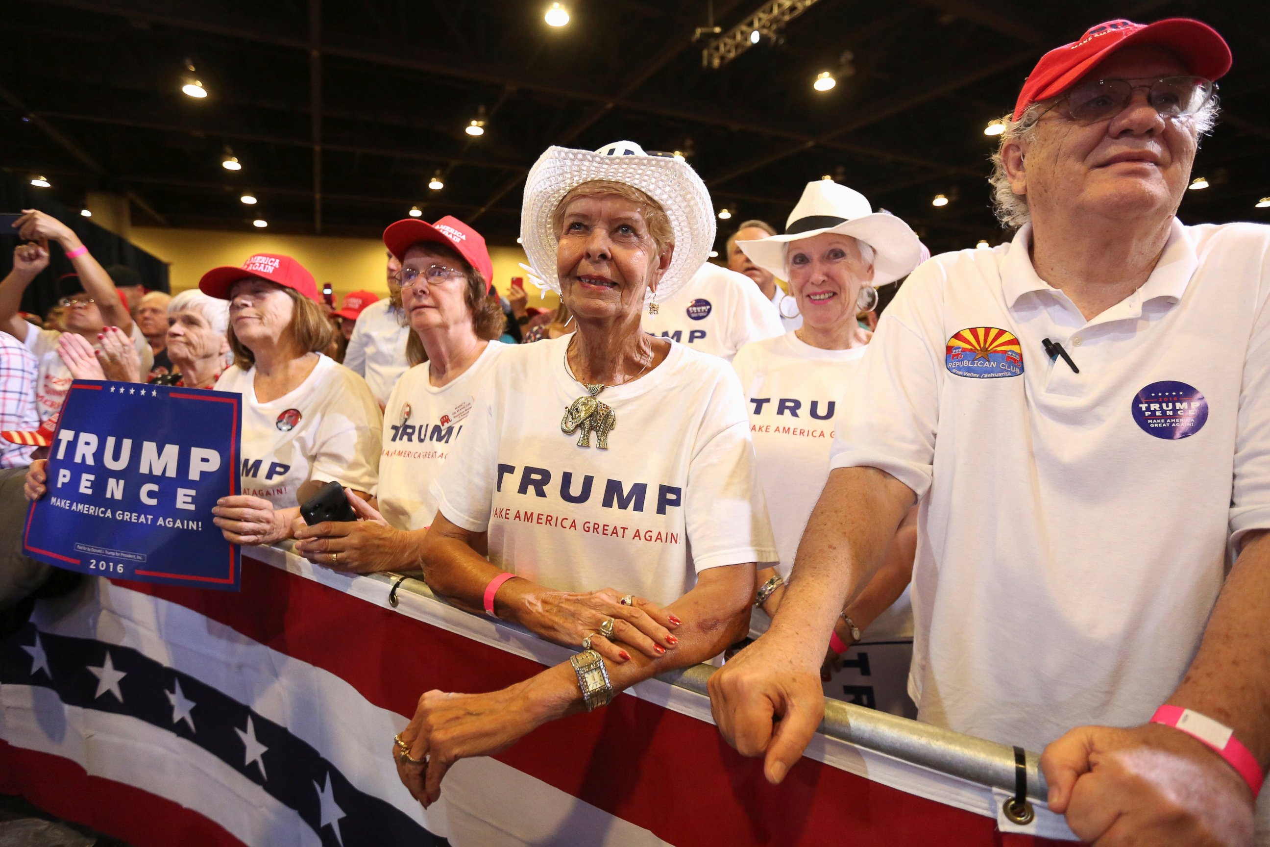 PHOTO: Supporters listen to Republican presidential nominee Donald Trump as he speaks at a campaign rally in Phoenix, Aug. 31, 2016.  