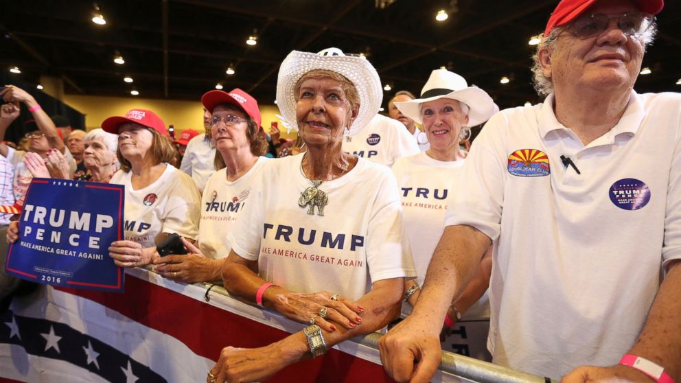 PHOTO: Supporters listen to Republican presidential nominee Donald Trump as he speaks at a campaign rally in Phoenix, Aug. 31, 2016.  