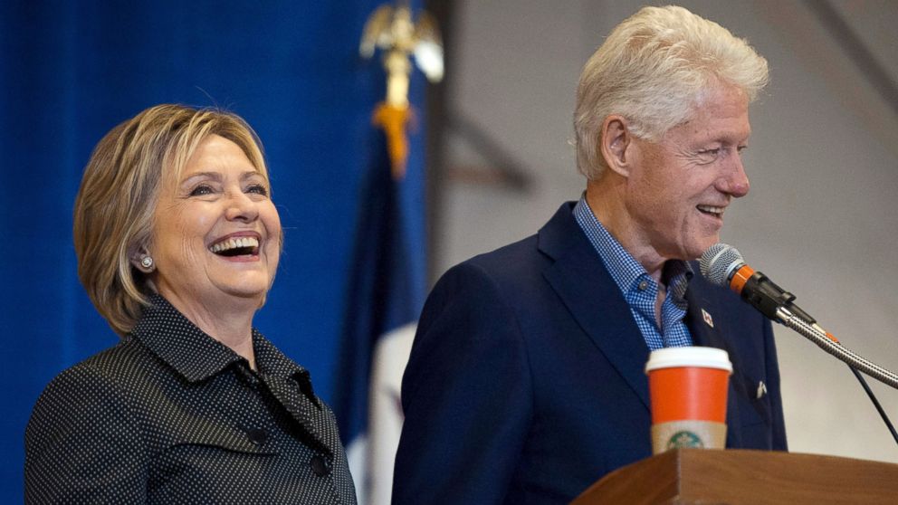 Former President Bill Clinton and Democratic presidential candidate Hillary Clinton take the stage at the Central Iowa Democrats Fall Barbecue in Ames, Iowa, Nov. 15, 2015.