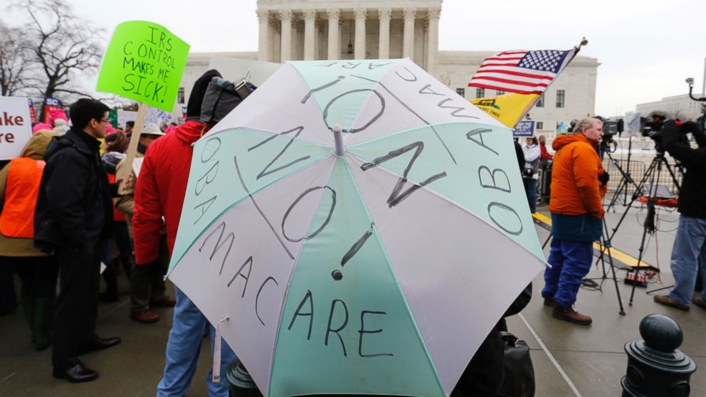 Anti-Obamacare demonstrators affiliated with the Tea Party Patriots demonstrate at the Supreme Court building in Washington, March 4, 2015.