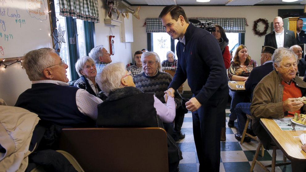 Sen. Marco Rubio greets diners at George's Diner in Meredith, N.H., Dec. 21, 2015. 
