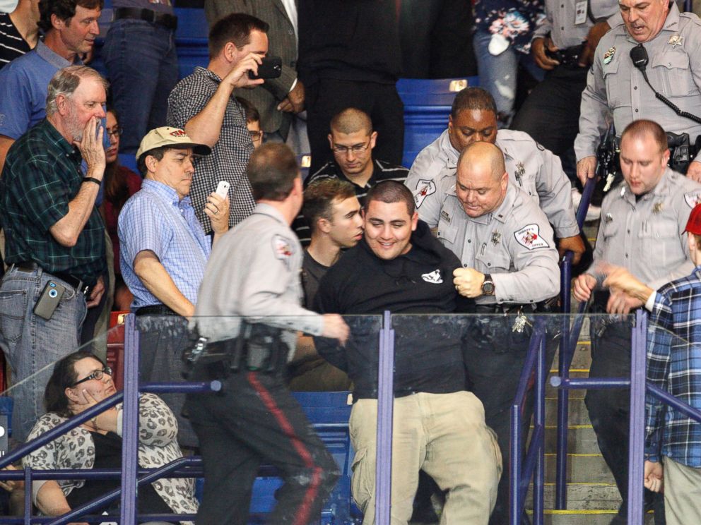 PHOTO: Police officers forcibly remove a protester at U.S. Republican presidential candidate Donald Trumps campaign rally in Fayetteville, North Carolina March 9, 2016.