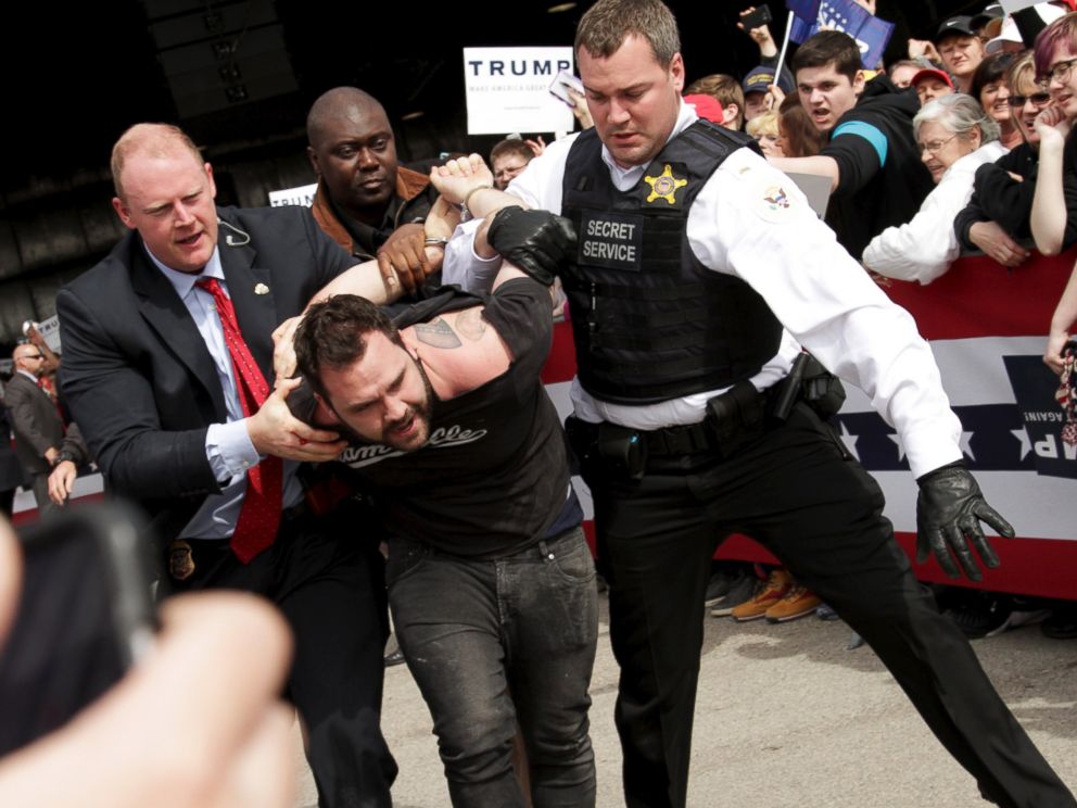 PHOTO: U.S. Secret Service agents detain a man after a disturbance as Republican presidential candidate Donald Trump spoke at Dayton International Airport in Dayton, Ohio, March 12, 2016.
