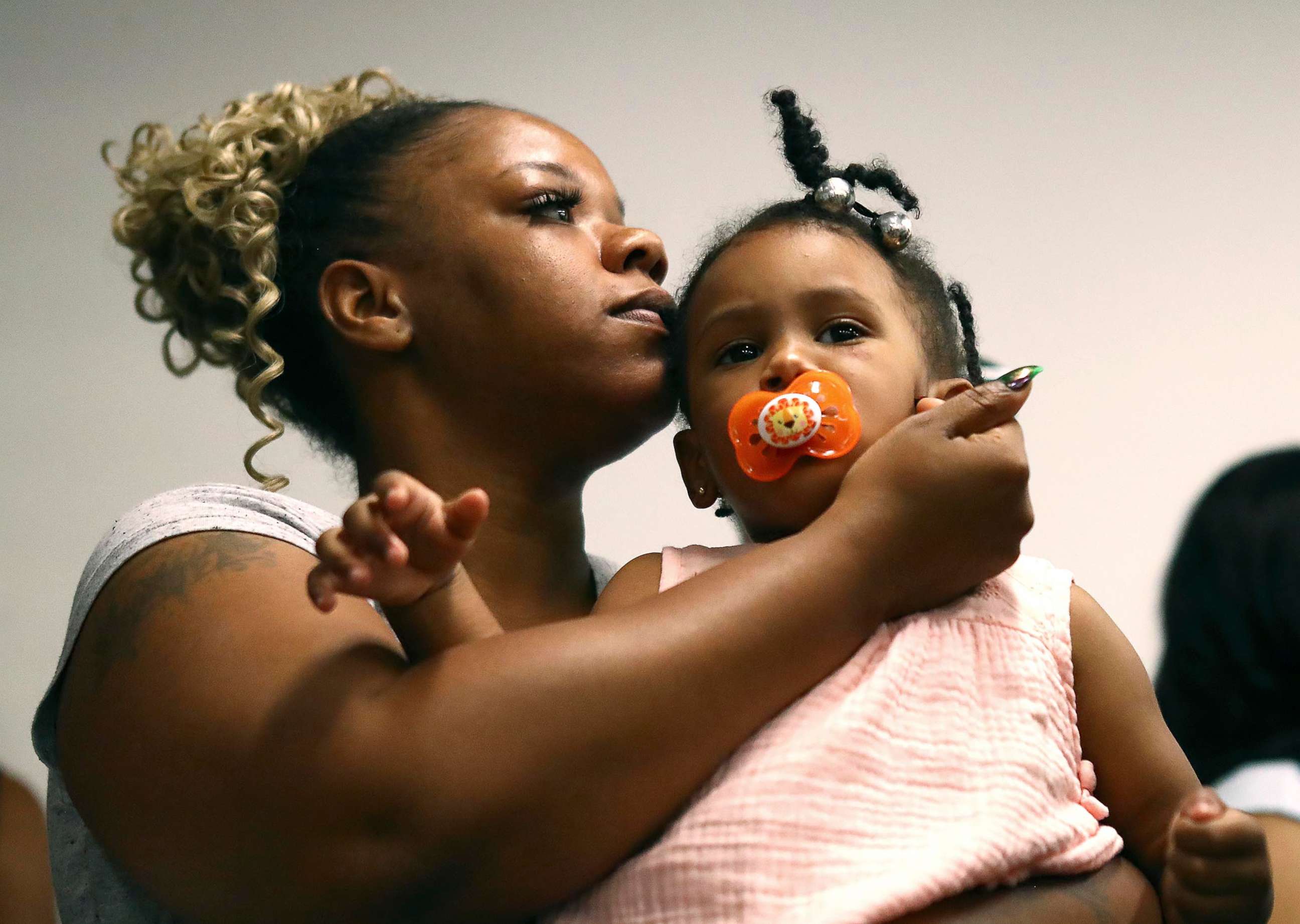 PHOTO: Tomika Miller, the wife of Rayshard Brooks, holds their daughter Memory, 2, during the family press conference, June 15, 2020, in Atlanta.