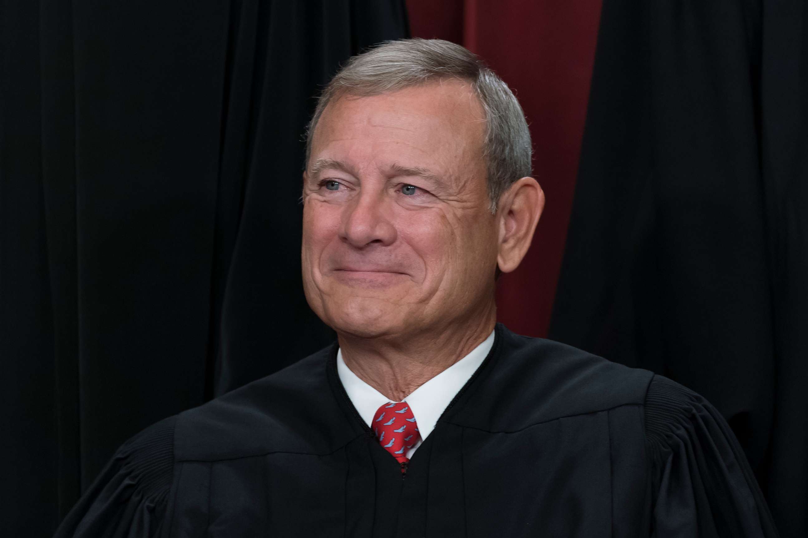 PHOTO: FILE - Chief Justice of the United States John Roberts joins other members of the Supreme Court as they pose for a new group portrait, at the Supreme Court building in Washington, Oct. 7, 2022.