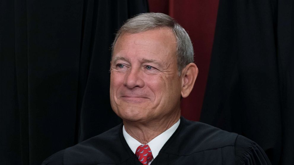 PHOTO: FILE - Chief Justice of the United States John Roberts joins other members of the Supreme Court as they pose for a new group portrait, at the Supreme Court building in Washington, Oct. 7, 2022.