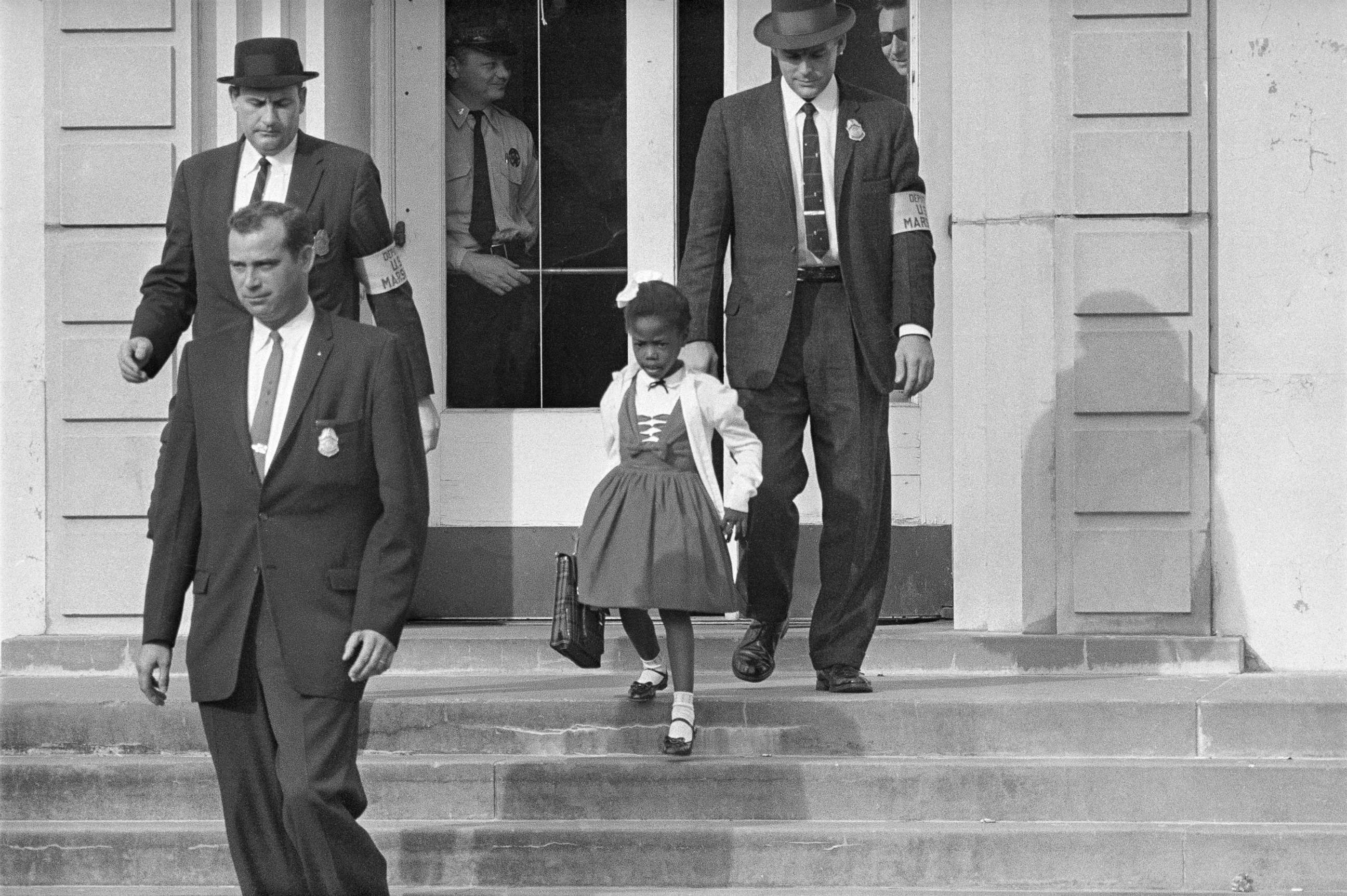 PHOTO: U.S. Deputy Marshals escort 6-year-old Ruby Bridges from William Frantz Elementary School in New Orleans, in November 1960.