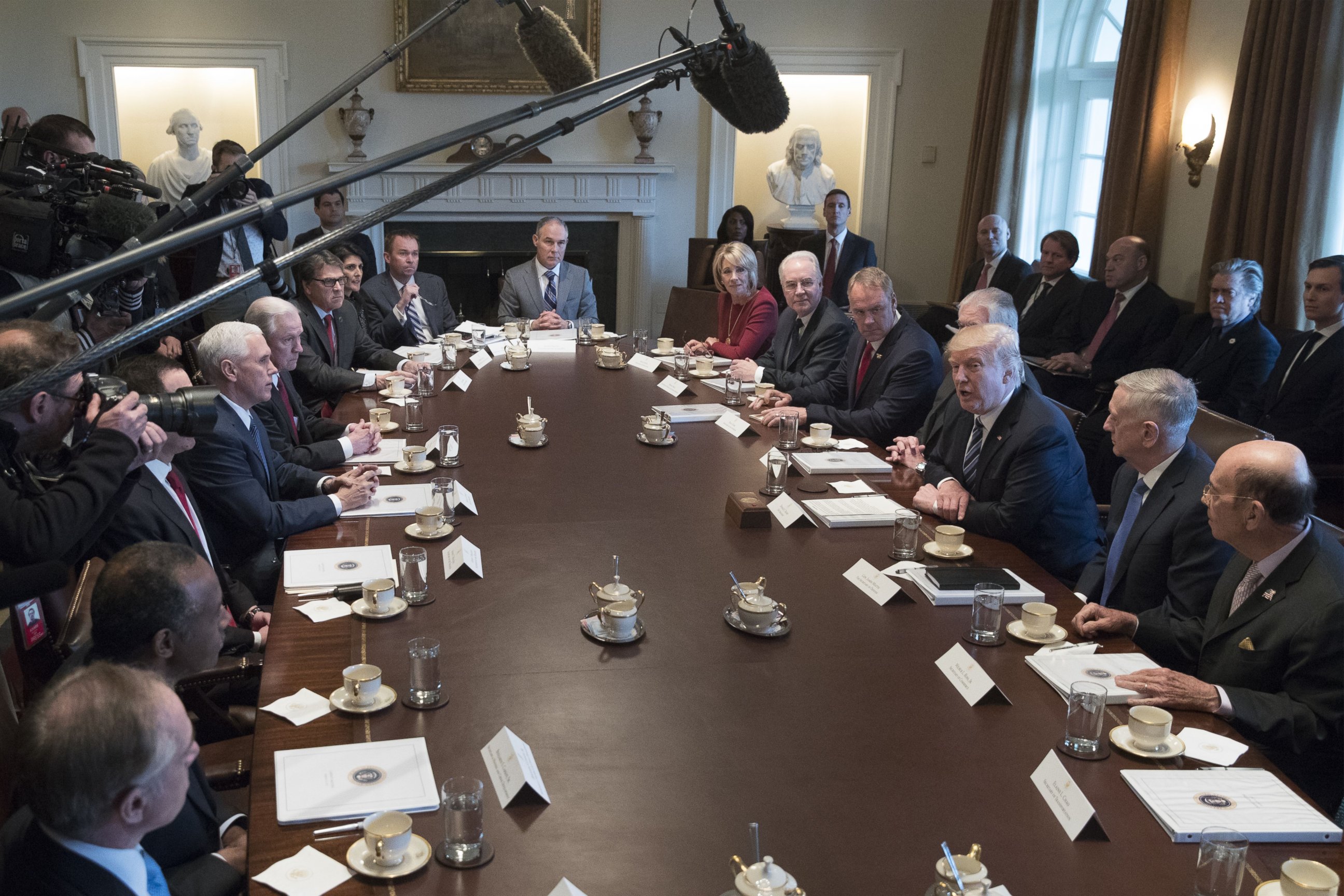 PHOTO: U.S. President Donald J. Trump (3-R) holds a meeting with members of his Cabinet in the Cabinet Room, on March 13, 2017, in Washington.