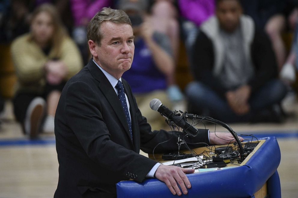 PHOTO: Sen. Michael Bennet speaks during a candlelight vigil at Highlands Ranch High School on May 8, 2019 in Highlands Ranch, Colo.