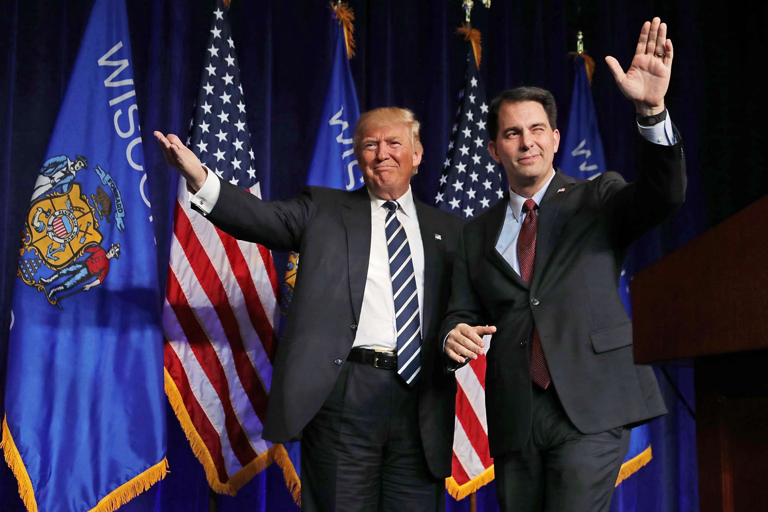 PHOTO: Republican presidential nominee Donald Trump is welcomed to the stage by Wisconsin Governor Scott Walker during a campaign rally at the W.L. Zorn Arena, Nov. 1, 2016 in Altoona, Wisc. 
