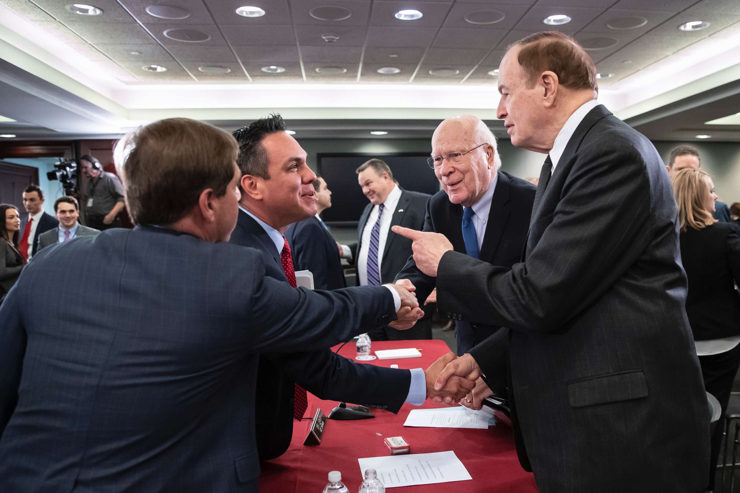PHOTO: Politicians greet each other as the bipartisan group of House and Senate bargainers finished their first meeting to craft a border security compromise in hope of avoiding another government shutdown, at the Capitol, Jan. 30, 2019. 