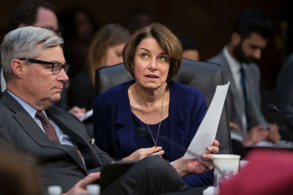 PHOTO: Senate Judiciary Committee member Sen. Amy Klobuchar, joined by Sen. Sheldon Whitehouse, prepares to vote against advancing William Barr's nomination for attorney general, as the panel meets on Capitol Hill in Washington, Feb. 7, 2019.