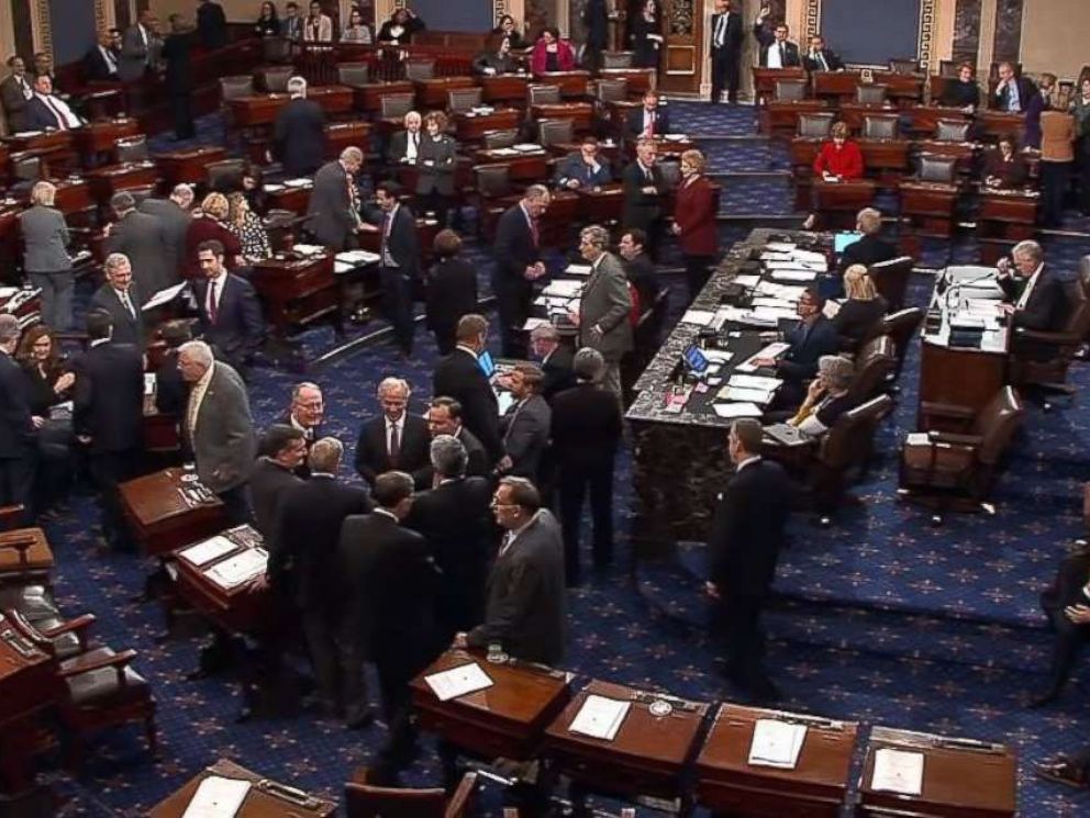 PHOTO: Senators negotiate after they failed to pass a deal to fund the government on Jan. 20, 2018.