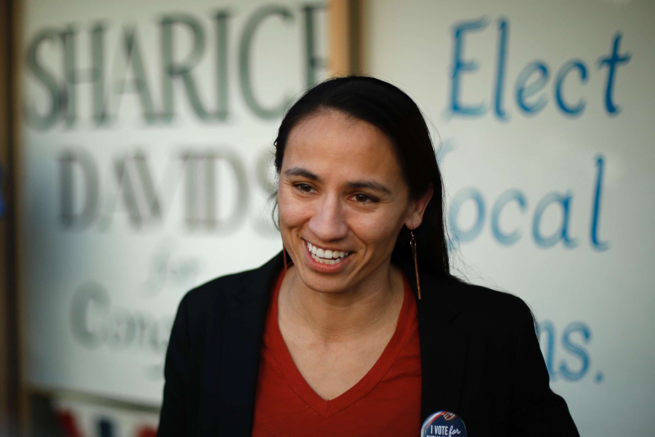 PHOTO: Democratic Congressional candidate Sharice Davids talks to supporters at her campaign office on Oct 22, 2018 in Overland Park, Kan.