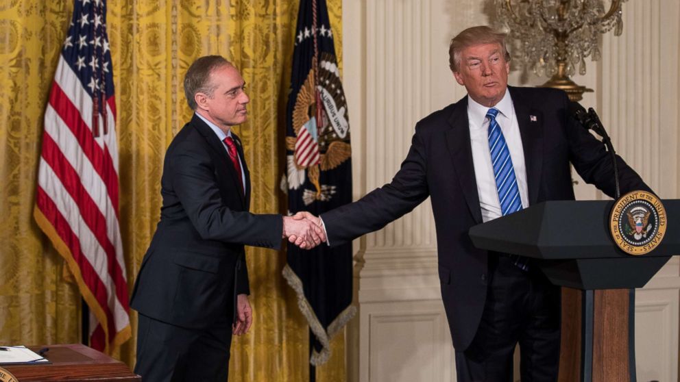 VA Secretary David Shulkin, and President Donald Trump shake hands, before President Trump signs the Department of Veterans Affairs Accountability and Whistleblower Protection Act of 2017 in the East Room of the White House, on June 23, 2017.