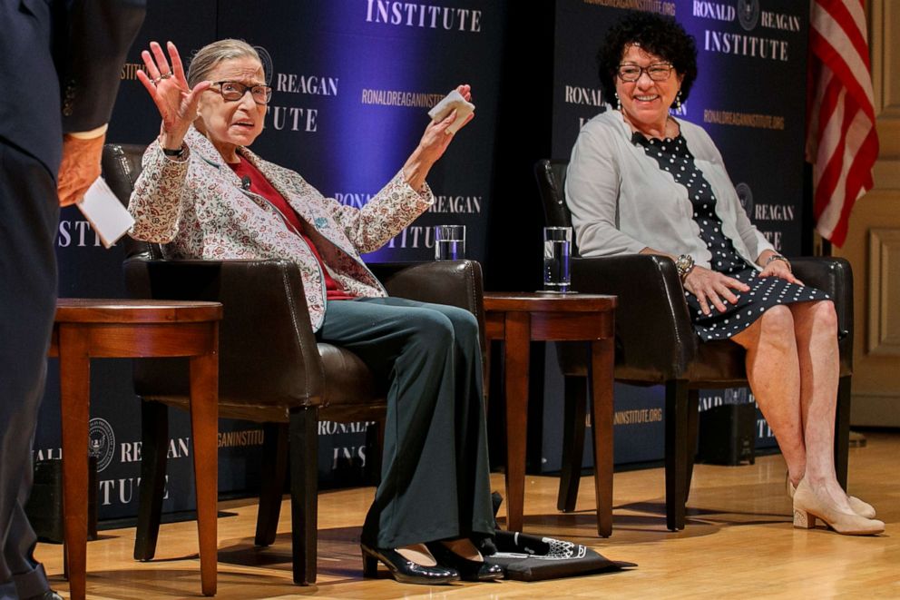 PHOTO: Supreme Court Justices Ruth Bader Ginsburg and Supreme Sonia Sotomayor arrive to applause for a panel discussion celebrating Sandra Day O'Connor, at the Library of Congress in Washington, D.C., Sept. 25, 2019. 