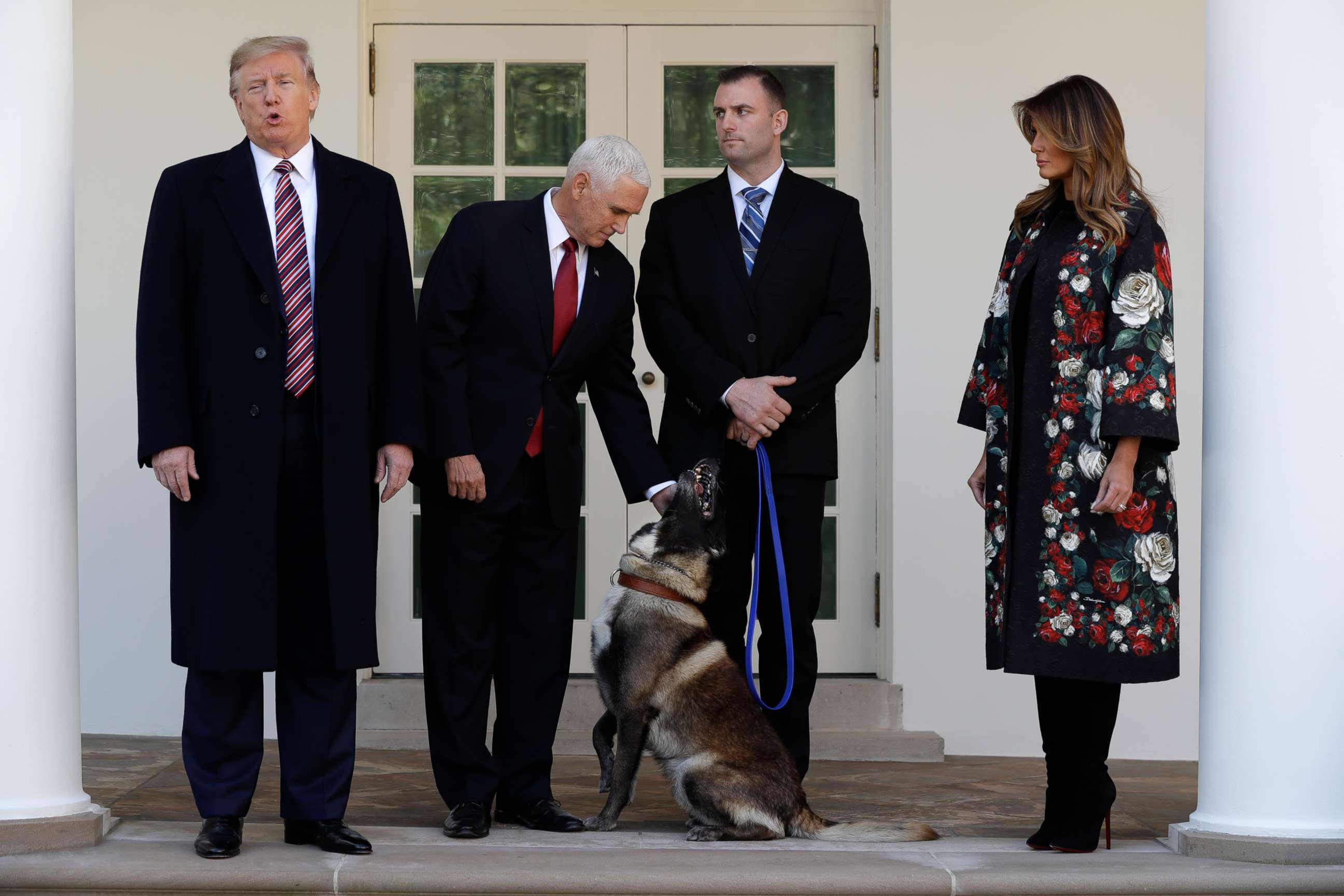 PHOTO: President Donald Trump, Vice President Mike Pence and first lady Melania Trump present Conan, the military working dog injured in the successful operation targeting Islamic State leader Abu Bakr al-Baghdadi.