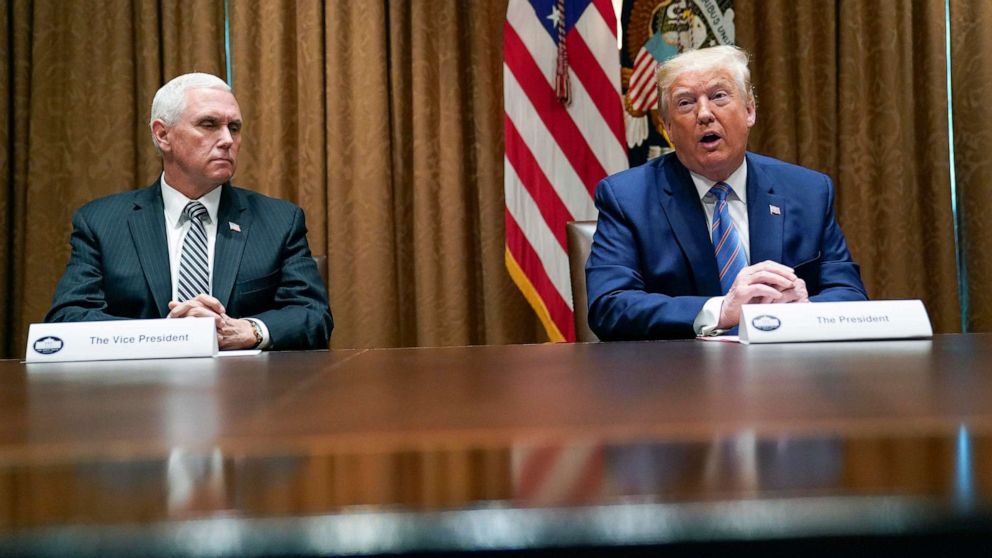 PHOTO: President Donald Trump speaks during a roundtable about America's seniors, in the Cabinet Room of the White House, June 15, 2020, as Vice President Mike Pence listens. 