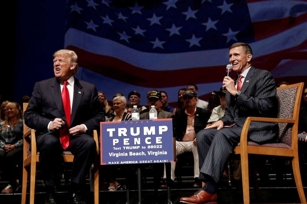 PHOTO: Republican presidential nominee Donald Trump speaks alongside retired U.S. Army Lieutenant  General Mike Flynn during a campaign town hall meeting in Virginia Beach, Va., Sept. 6, 2016.