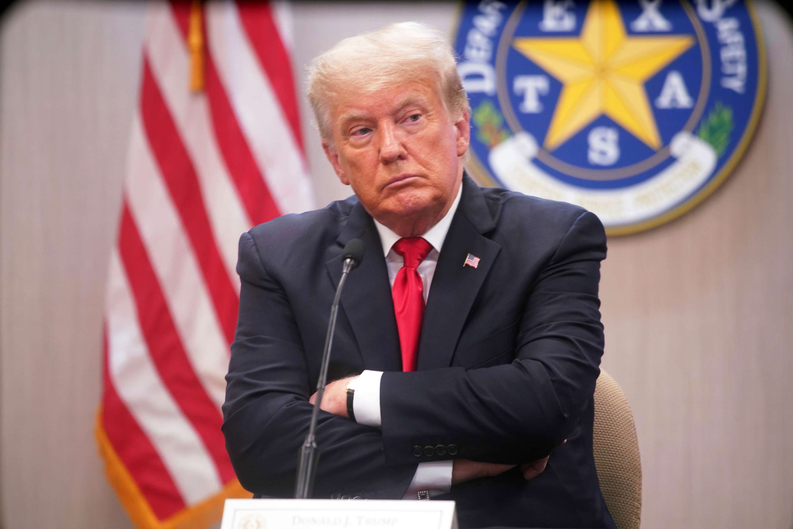 PHOTO: Former President Donald Trump listens to speakers at a border security briefing at the Texas DPS Weslaco Regional Office on Wednesday, June 30, 2021, in Weslaco, Texas.