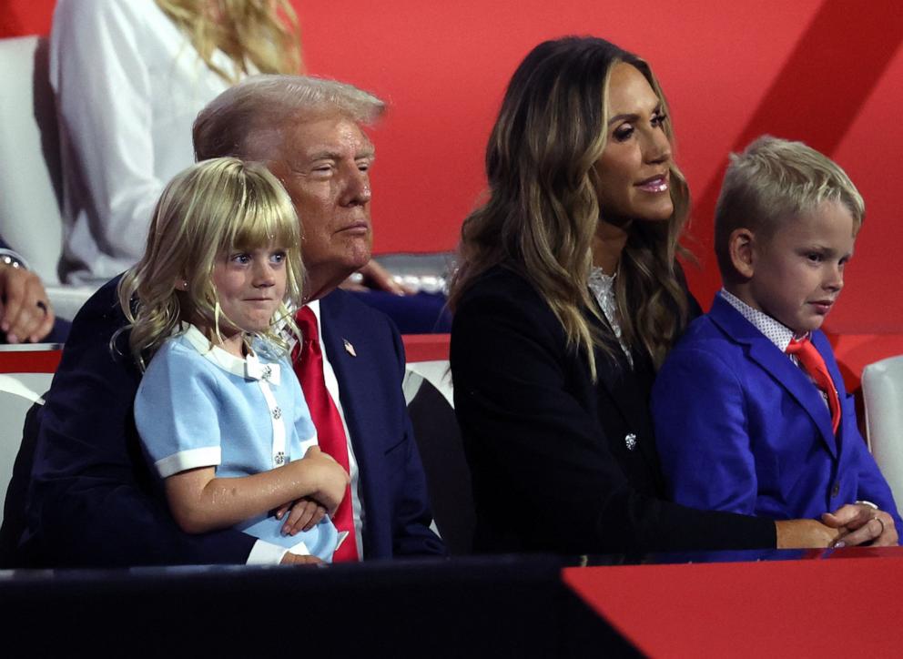 PHOTO: Republican presidential nominee and former President Donald Trump, Lara Trump, Eric Luke Trump, and Carolina Dorothy Trump look on on Day 4 of the Republican National Convention at the Fiserv Forum in Milwaukee, Wisconsin, U.S., July 18, 2024.