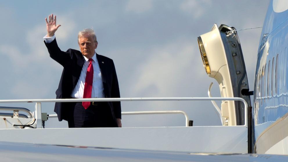 PHOTO: President Donald Trump waves as he boards Air Force One at Palm Beach International Airport in West Palm Beach, Fla., Feb. 9, 2025. 