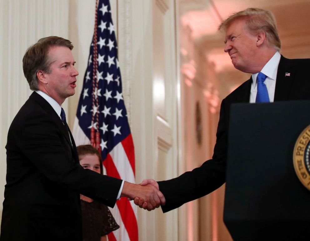 PHOTO: President Donald Trump shakes hands with Judge Brett Kavanaugh his Supreme Court nominee, in the East Room of the White House, July 9, 2018, in Washington.