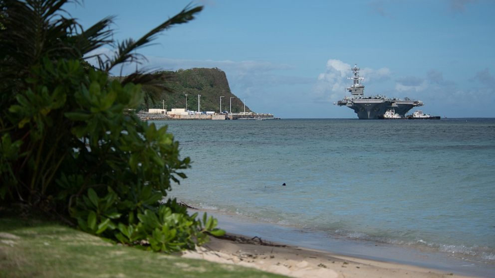 PHOTO: The aircraft carrier USS Theodore Roosevelt (CVN 71) transits Apra Harbor as the ship prepares to moor in Guam. Theodore Roosevelt Is in Guam for a port visit during their scheduled deployment to the Indo-Pacific.