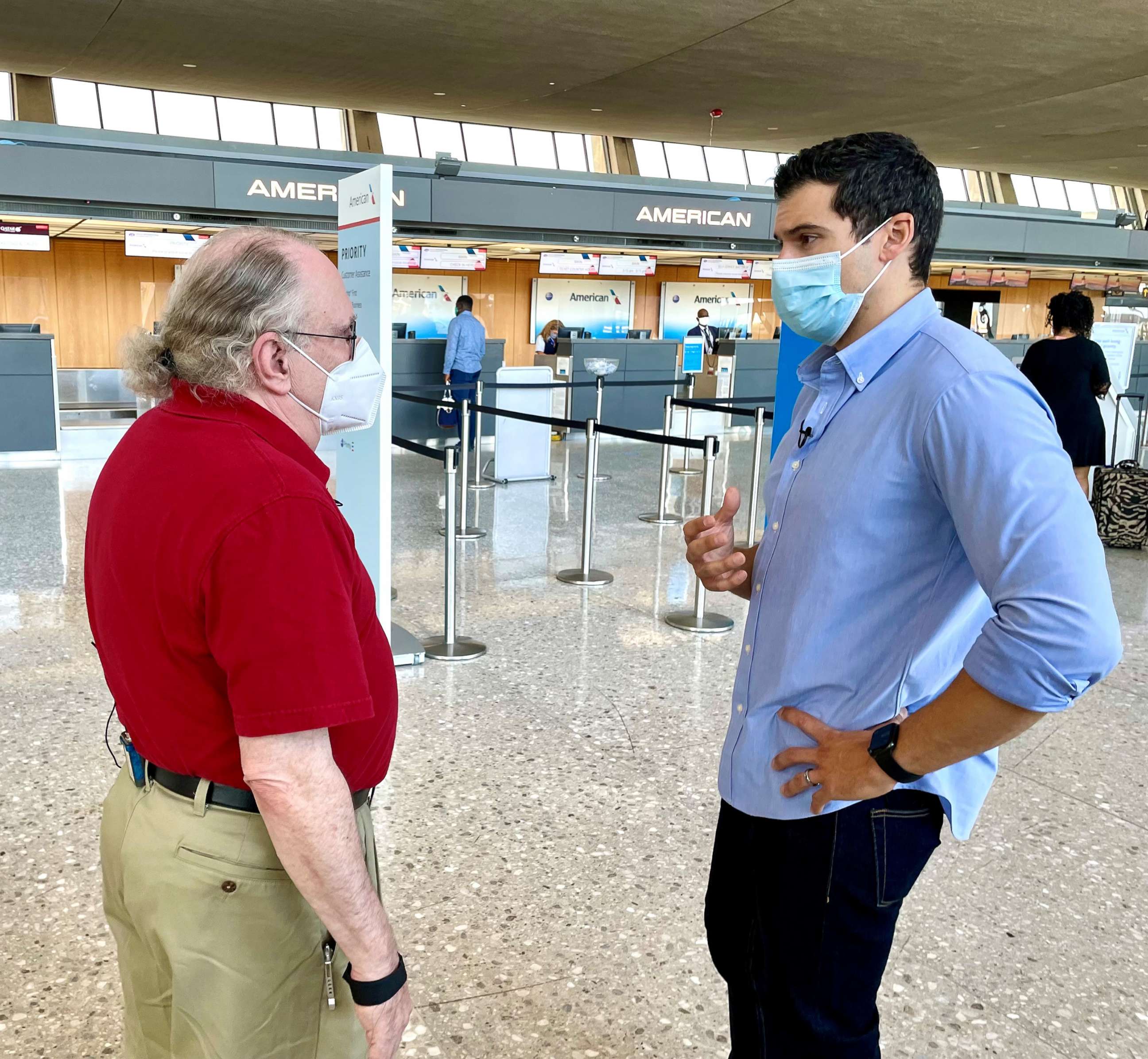 PHOTO: Ticket agent Vaughn Allex speaks with ABC News' Gio Benitez at Dulles International Airport, Aug. 24, 2021.