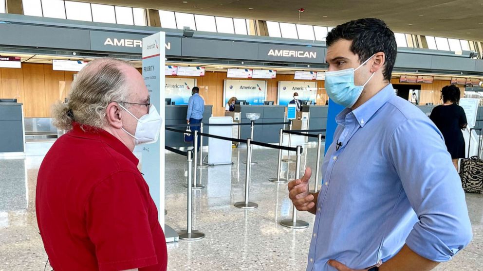 PHOTO: Ticket agent Vaughn Allex speaks with ABC News' Gio Benitez at Dulles International Airport, Aug. 24, 2021.