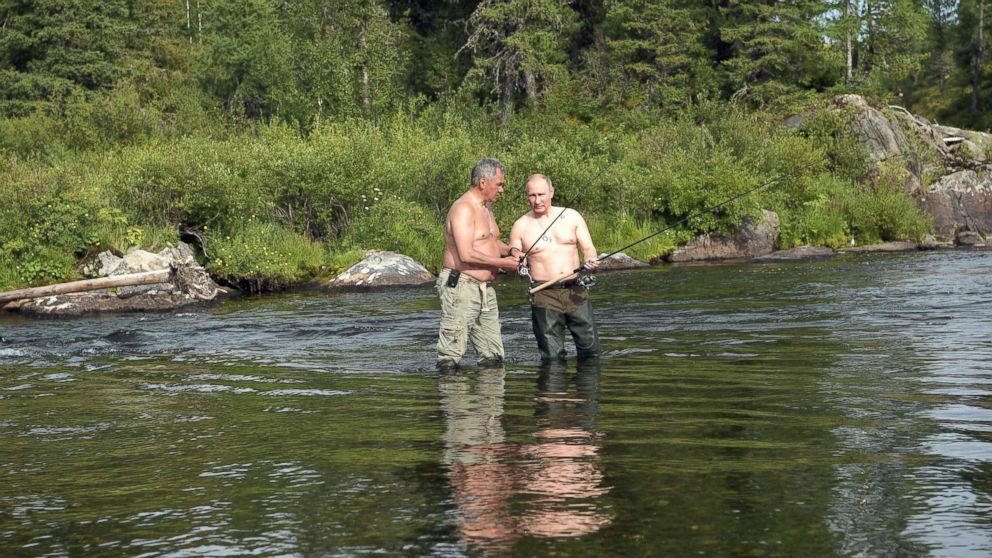 PHOTO: Russian President Vladimir Putin and defense minister Sergei Shoigu fish in the remote Tuva region in southern Siberia.