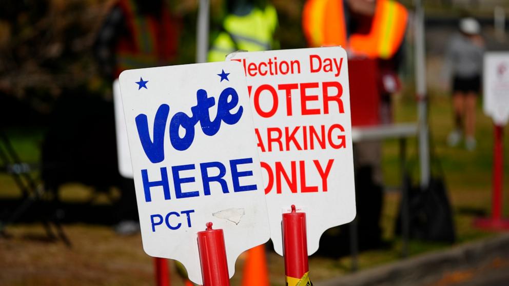 PHOTO: Signs direct voters to a ballot drop-off location in Denver, Col., Oct. 25, 2024.