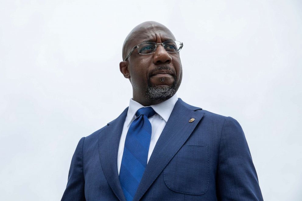 PHOTO: Sen. Raphael Warnock speaks to reporters about voting rights legislation on Capitol Hill, Aug. 3, 2021. 