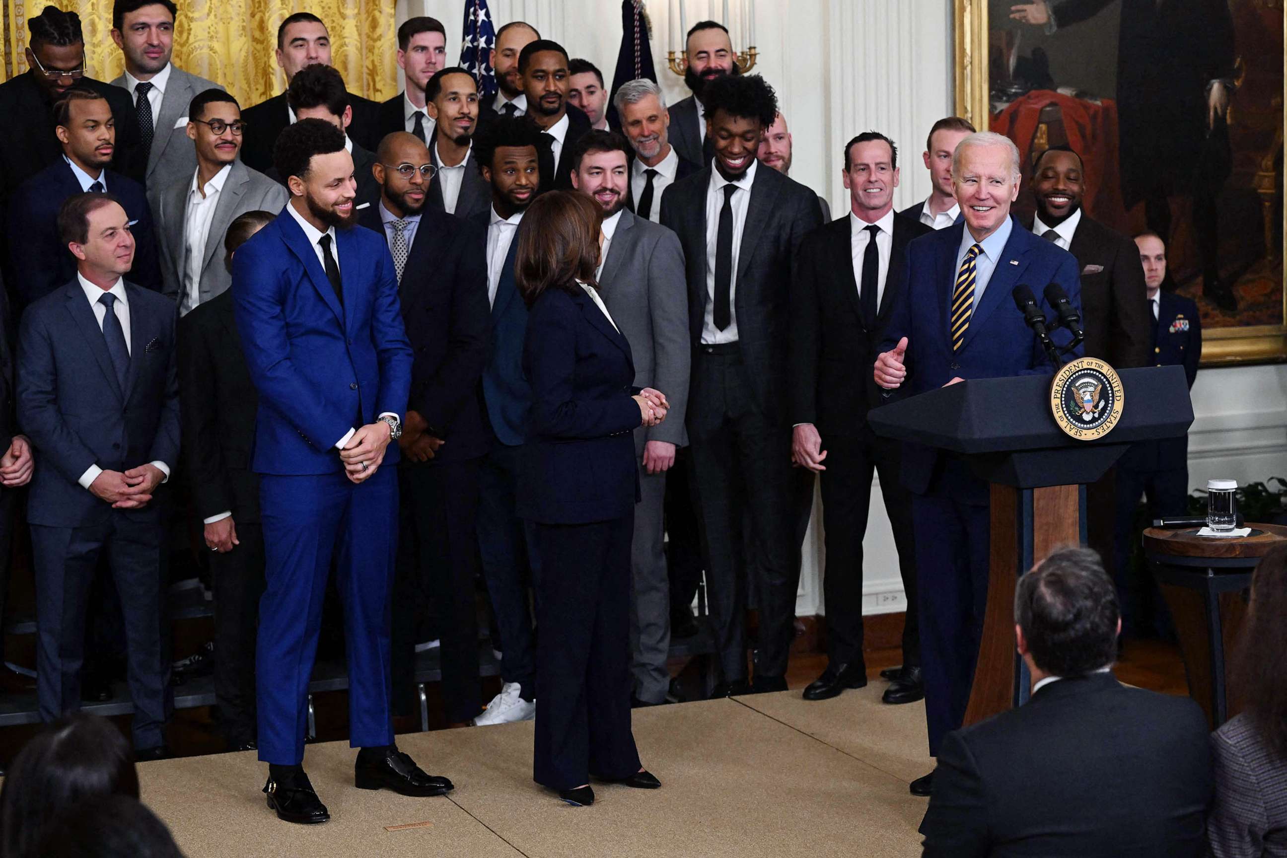 PHOTO: US President Joe Biden ans Vice President Kamala Harris host the 2022 NBA Champions, the Golden State Warriors, in the East Room of the White House in Washington, DC, Jan. 17, 2023.
