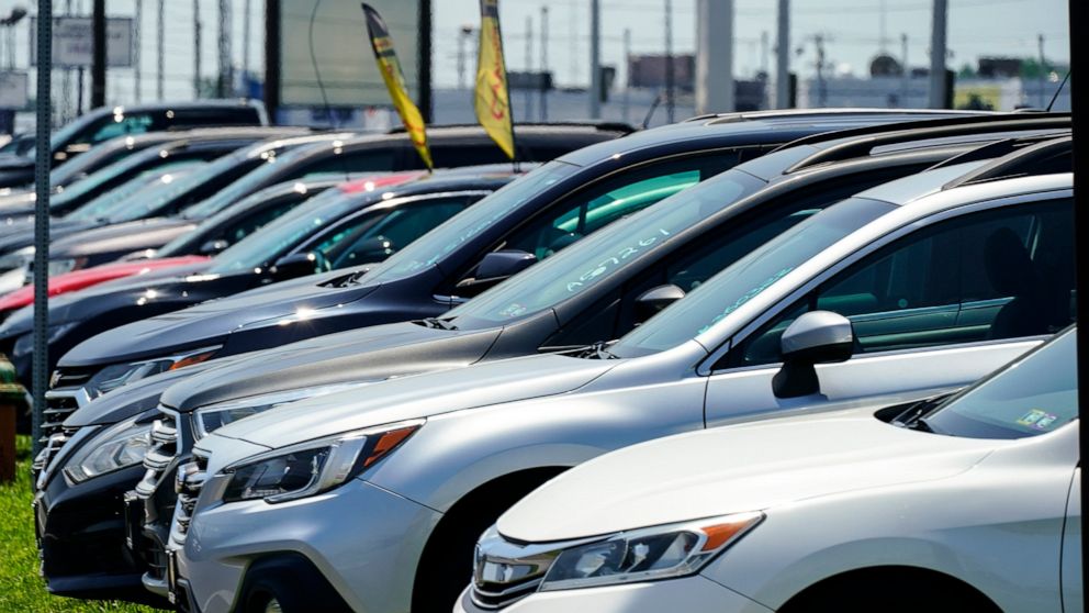 Used cars for sale are parked roadside at an auto lot in Philadelphia, Tuesday, July 12, 2022. On Wednesday, July 13, 2022, the Labor Department will report on U.S. consumer prices for June. (AP Photo/Matt Rourke)