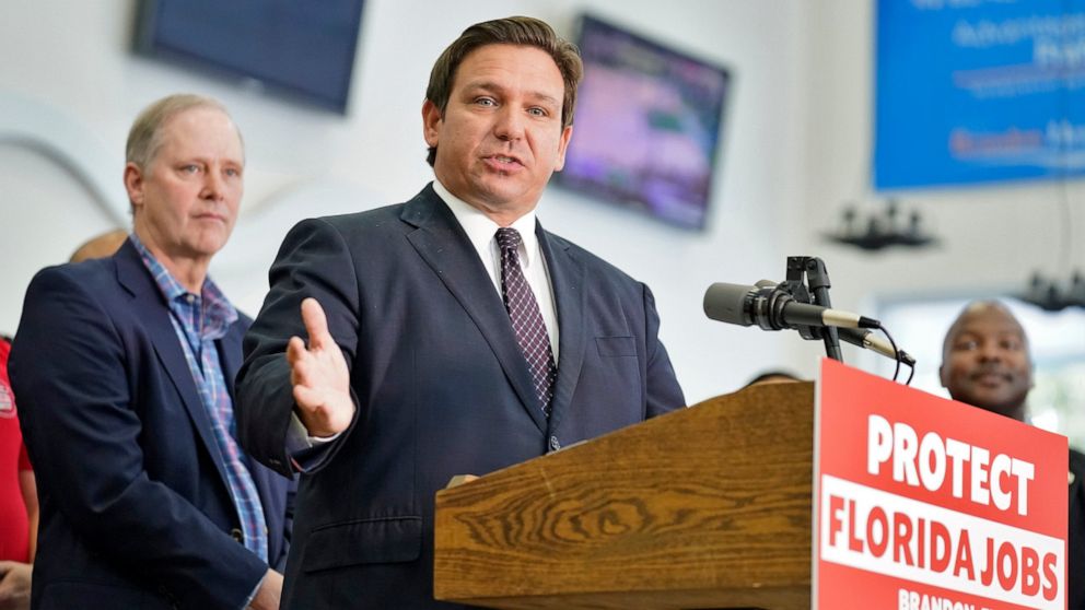 Florida Gov. Ron DeSantis speaks to supporters and members of the media after a bill signing Thursday, Nov. 18, 2021, in Brandon, Fla. DeSantis signed a bill that protects employees and their families from coronavirus vaccine and mask mandates. (AP P