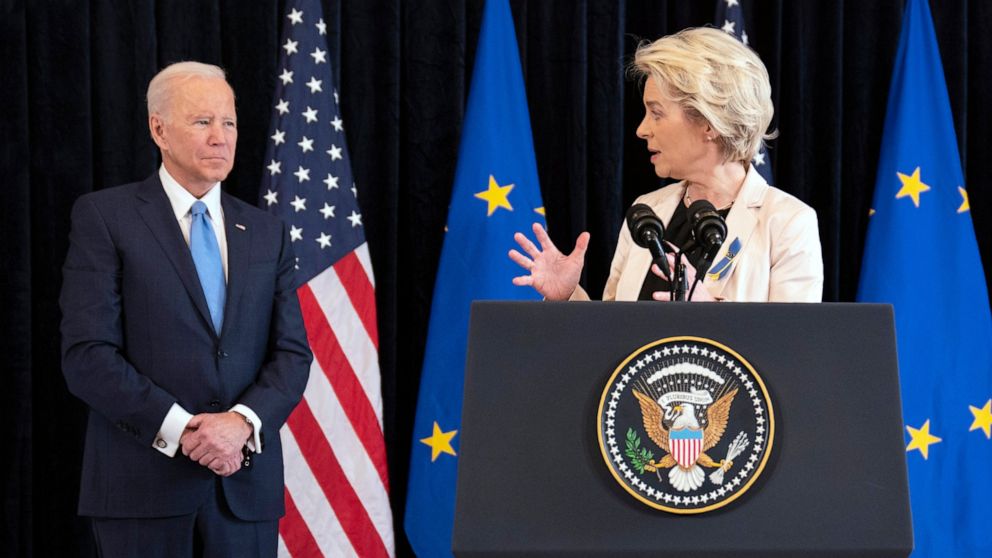 President Joe Biden listens as European Commission President Ursula von der Leyen speaks about the Russian invasion of Ukraine, at the U.S. Mission in Brussels, Friday, March 25, 2022, in Brussels. (AP Photo/Evan Vucci)